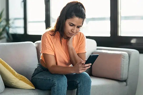 Woman reading something on her phone