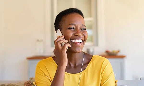 Woman talking on the phone.