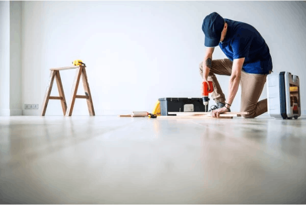 Man renovating flooring