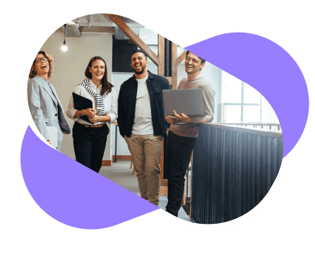 Colleagues standing near staircase