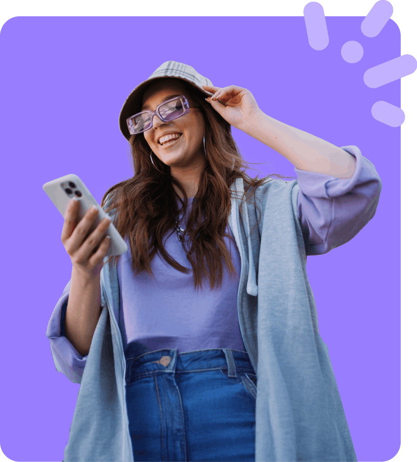 Woman in purple holding phone