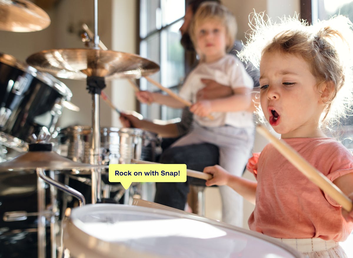 child playing the drums
