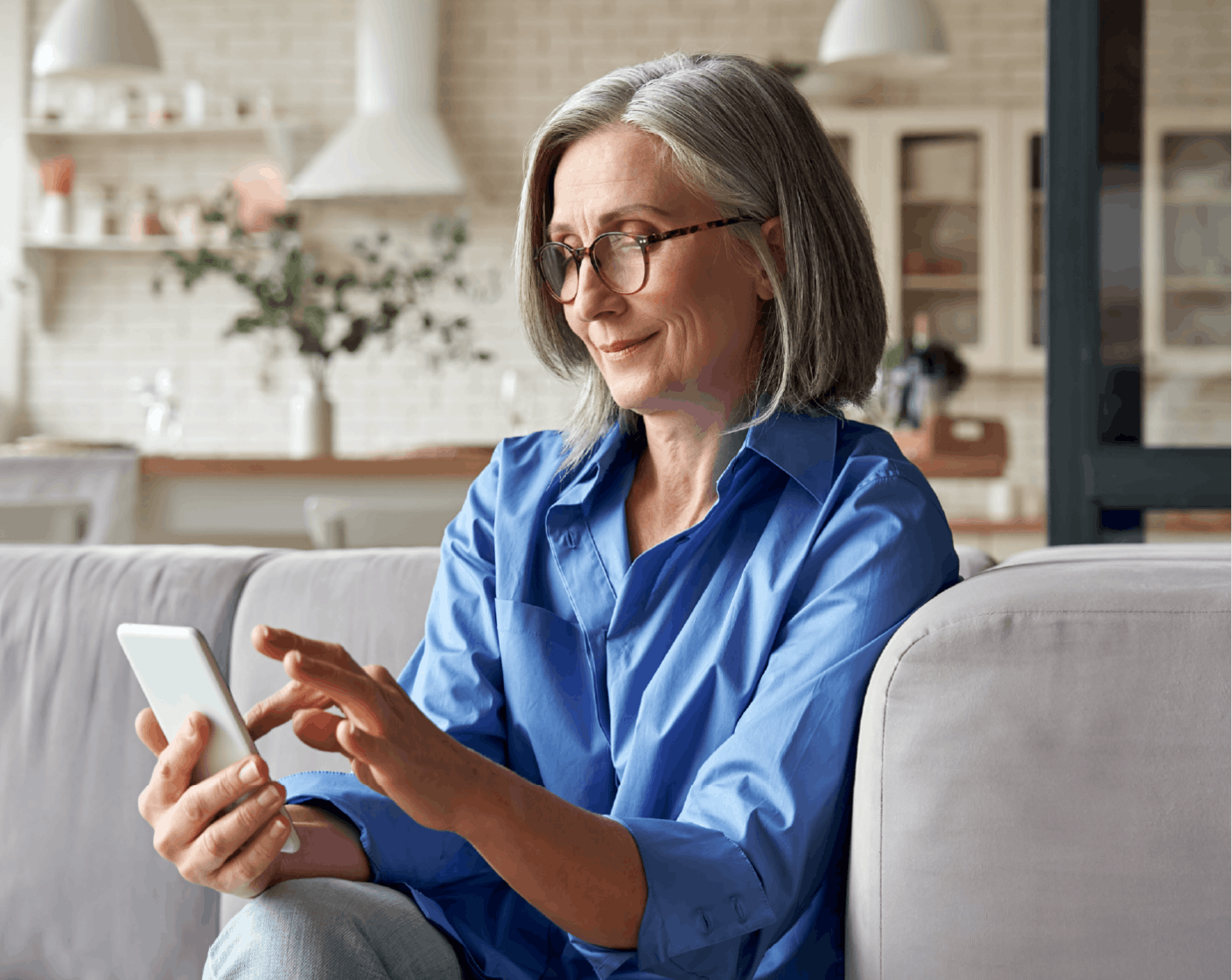 a woman looking her phone