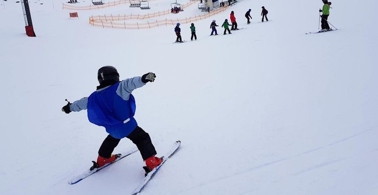 Beginner child ski lesson