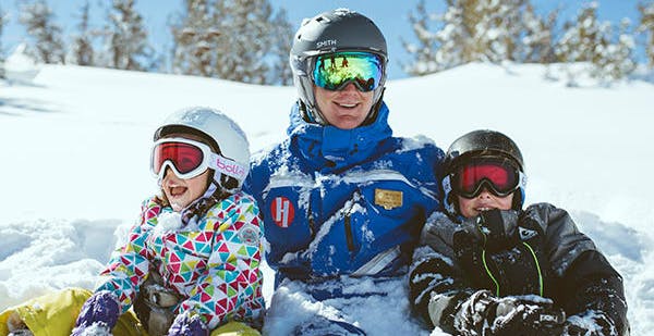 kids and ski instructor