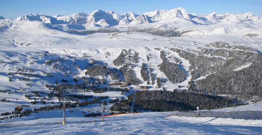 Enjoy incredible views of the Canadian Rockies as you ski