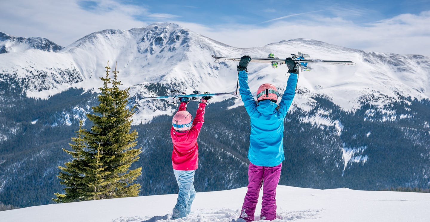 Children enjoying Winter Park near Denver, Colorado.