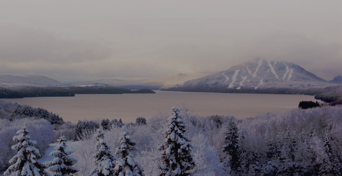 Lake Memphremagog by the snowy slopes of Owl's Head in Quebec, Canada, near Montreal.