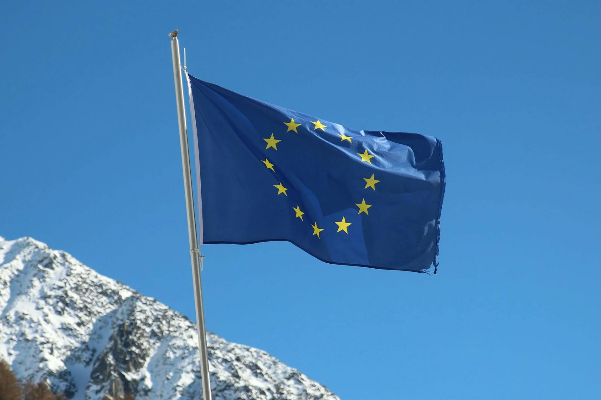 The European Union (E.U.) flag waving in the wind in Switzerland, Europe.