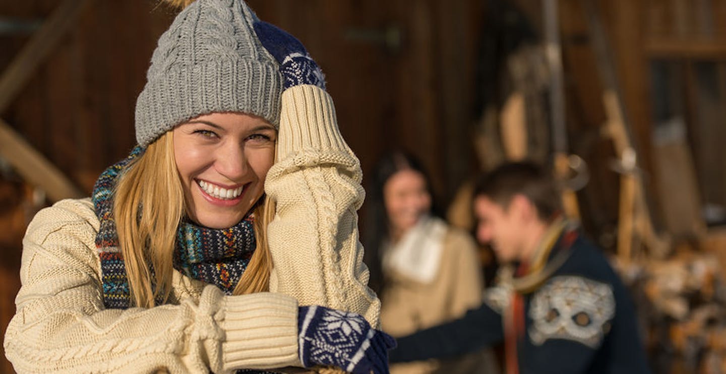 Young smiling woman in winter