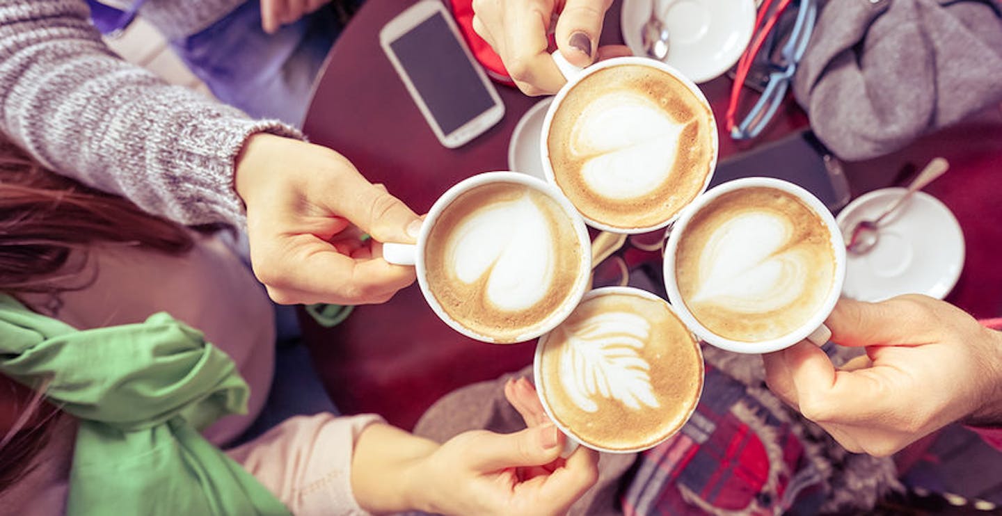 Group of friends drinking cappuccino