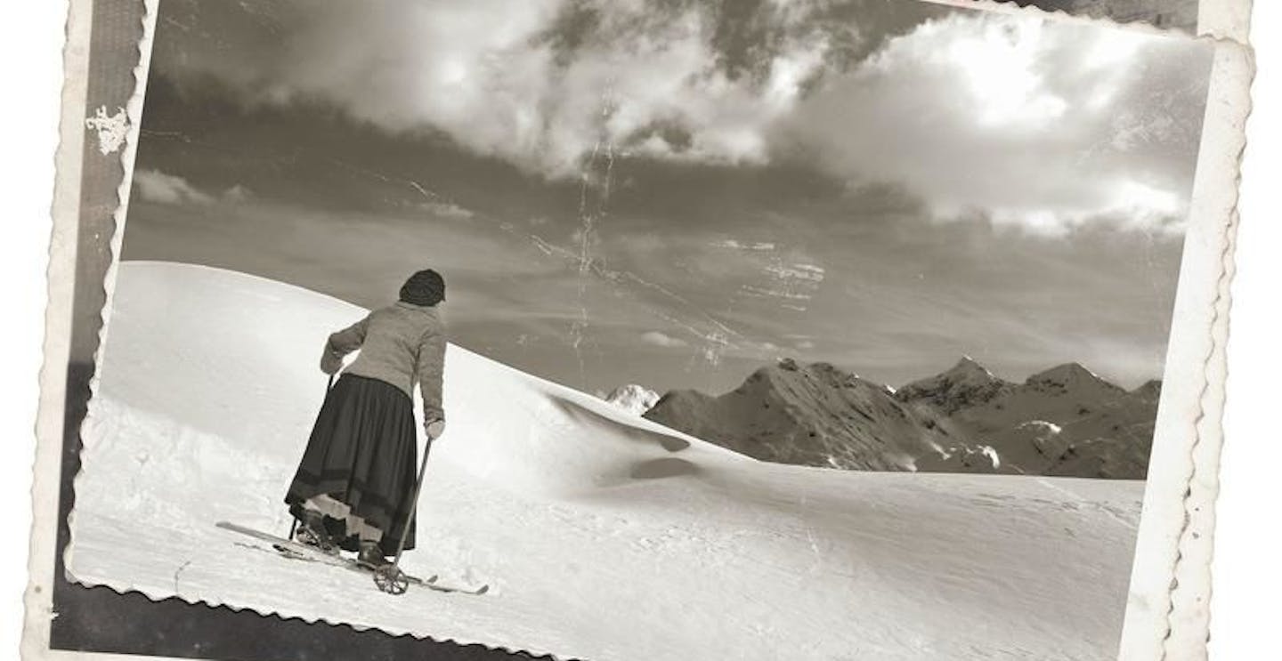 Photograph of woman skiing