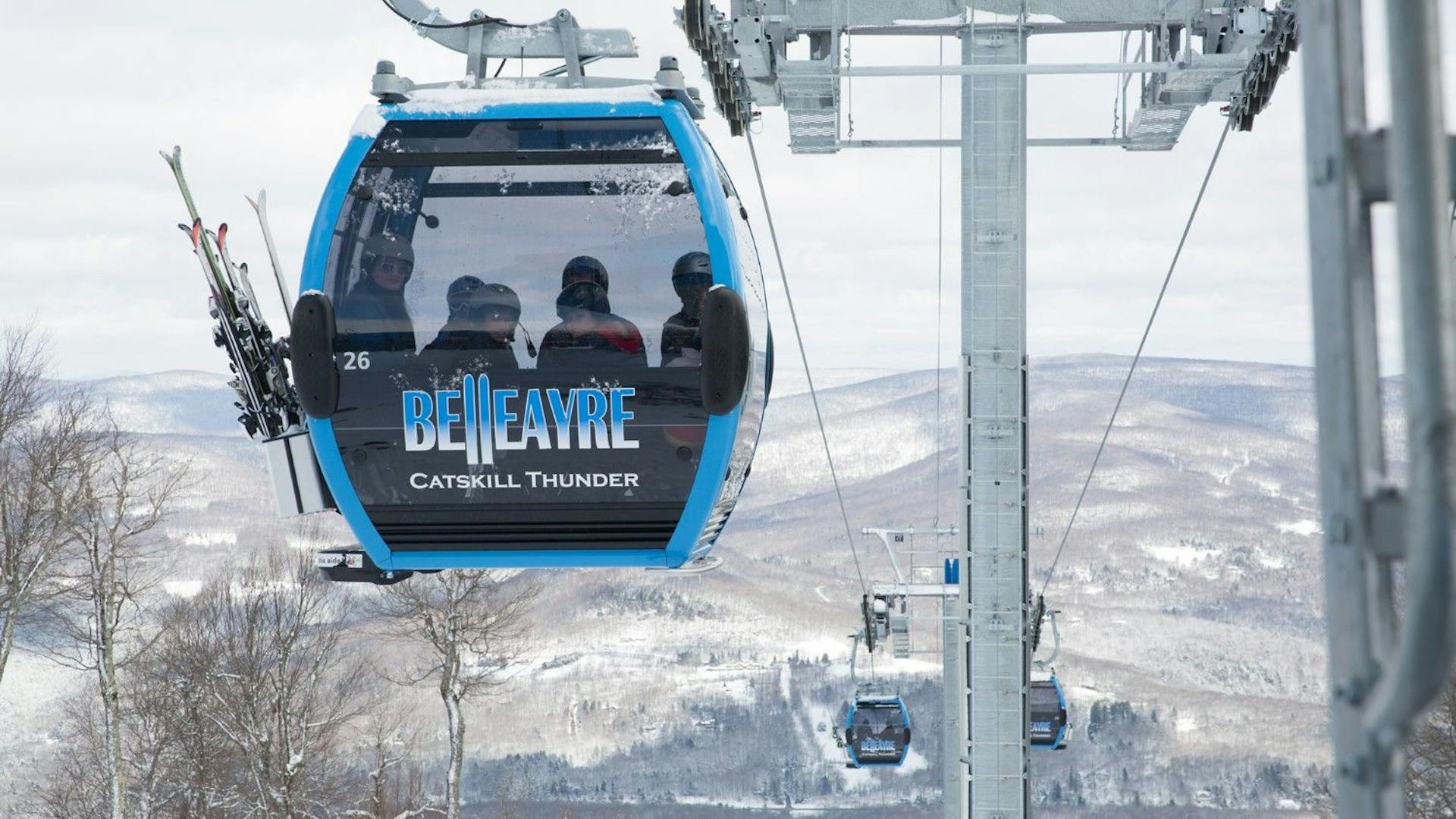 The gondola running with six skiers aboard at Belleayre in New York, USA.