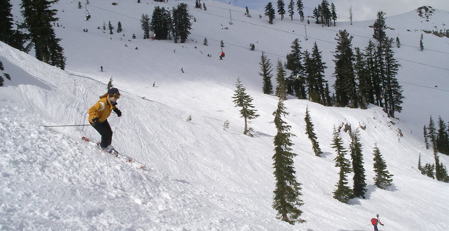 Skiing down Alpine Meadows slope