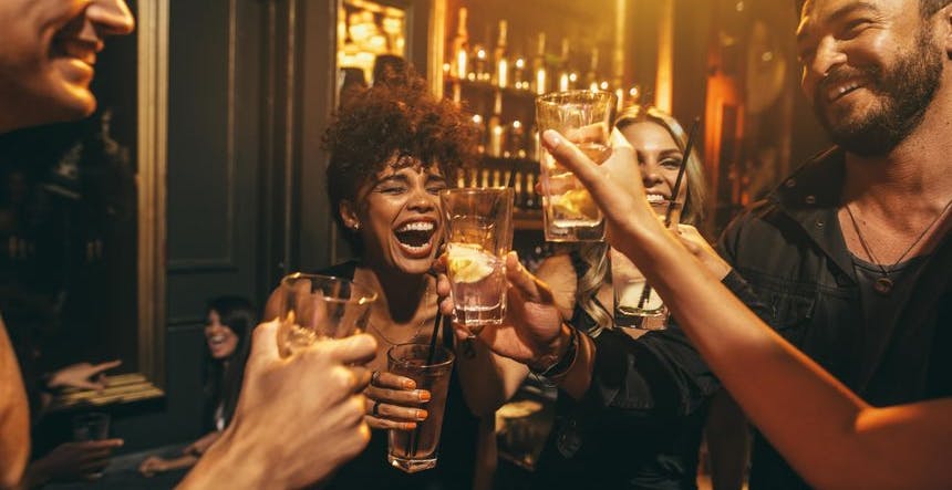 Friends having a drink at a bar