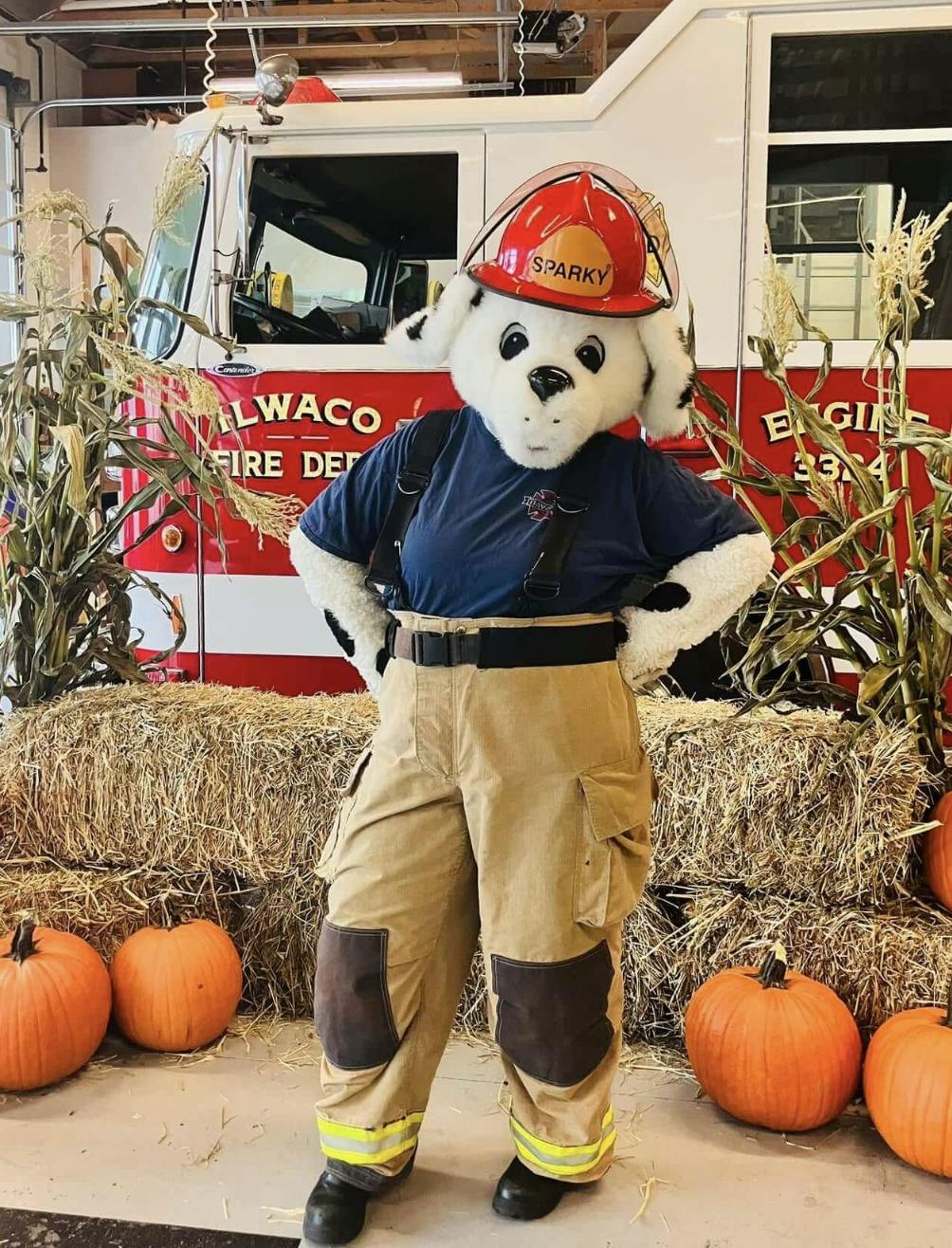 person dressed up like a dog as Fire Rescue person