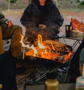 people around a fire pit