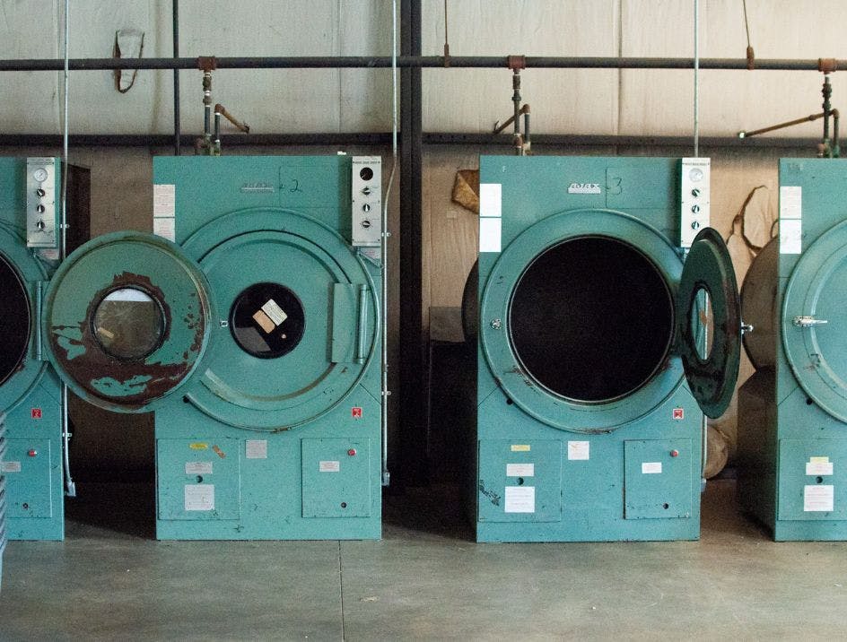 A row of branded sock dryers in our US sock manufacturing plant.