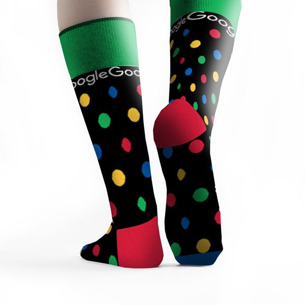 Back View of a black polka dot custom sock with logo for an internal event at Google