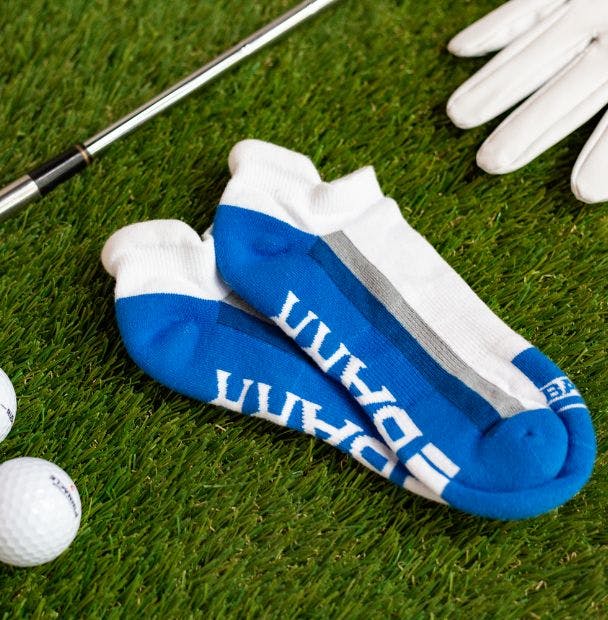 Custom athletic socks for nonprofit swag for a golf tournament fundraiser