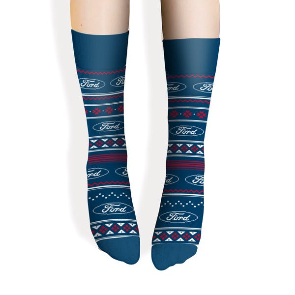 model wearing blue Christmas holiday themed socks for Ford 