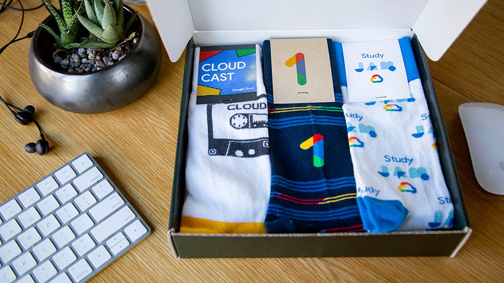 Google-branded logo socks in a box for new hire gift