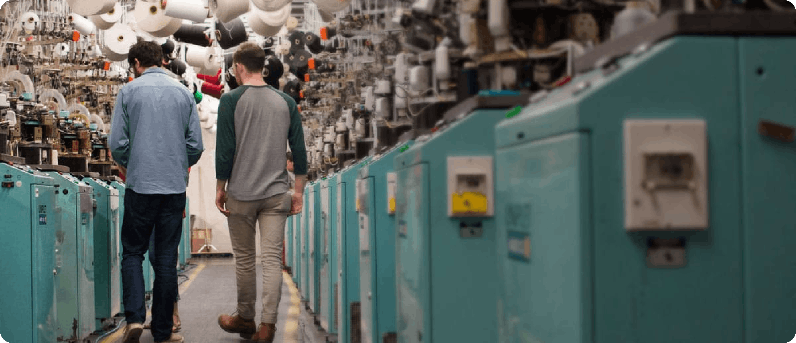 Dane and Noah walking through Sock Club mills