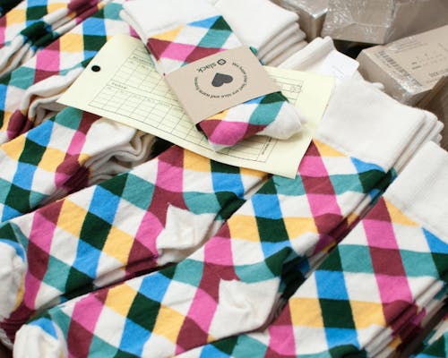 pile of custom socks with logo for slack