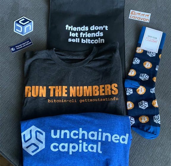 Custom Socks for Unchained Capital Branded Company Swag and Event Giveaways with Logo