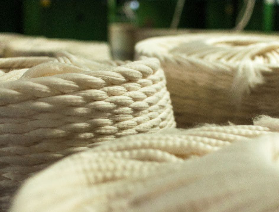 Thick cotton yarn strands after the first cotton spinning process