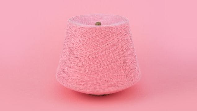 Pink skein of cotton yarn from Sock Club's custom sock colors