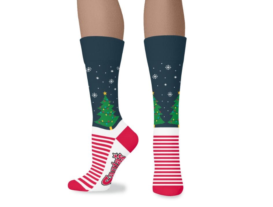 Holiday sock designs featuring snowflakes, Christmas trees, and candy cane stripes for corporate gifts