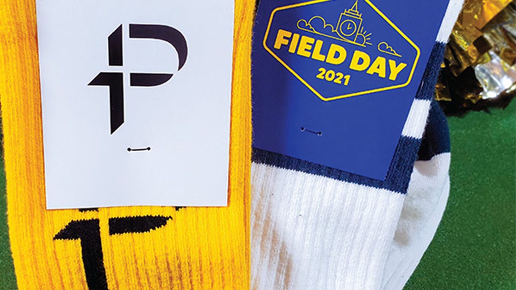 white and yellow custom soccer socks with custom sock packaging