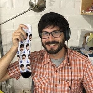 Founder, Noah Lee, with his custom face socks 