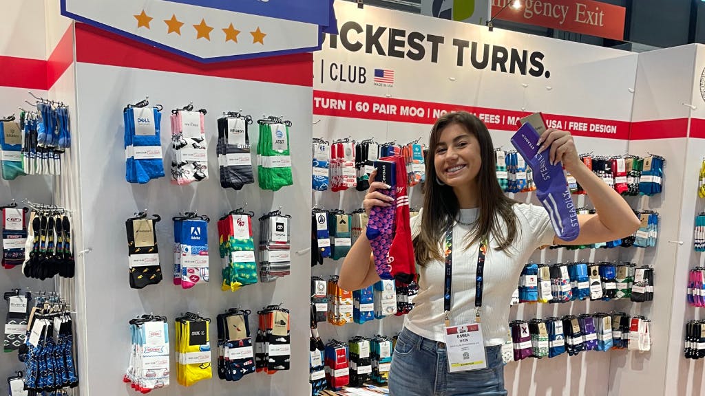 Emma Hein at Sock Club trade show booth at ASI Chicago 2022