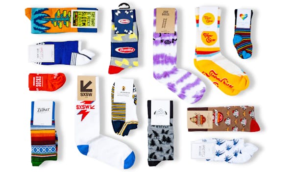 different types of custom socks laid out