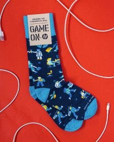 Custom socks for Hewlett Packard featuring custom sock packaging with the message "Game On"
