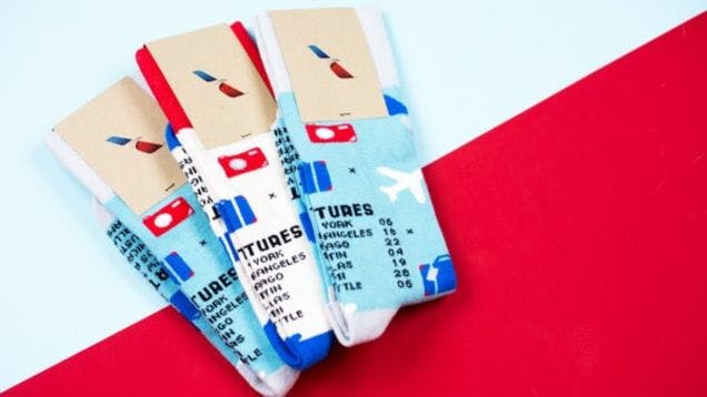 Custom socks for American Airlines on a colorful background