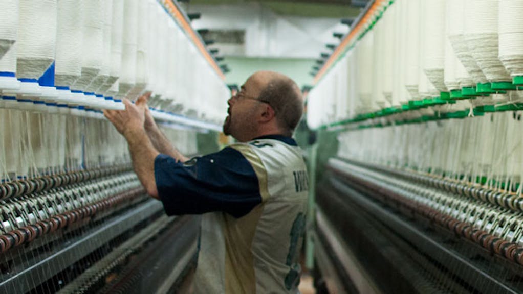 Person working in Sock Club's custom sock mill in North Carolina