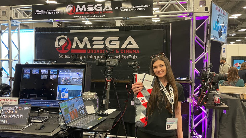 Girl with custom socks at trade show event SXSW