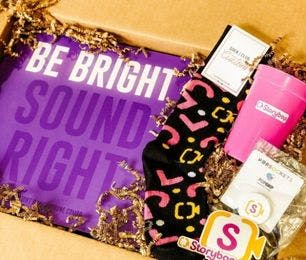 Swag box for Storybop containing custom socks from Sock Club created by Corporate Couture