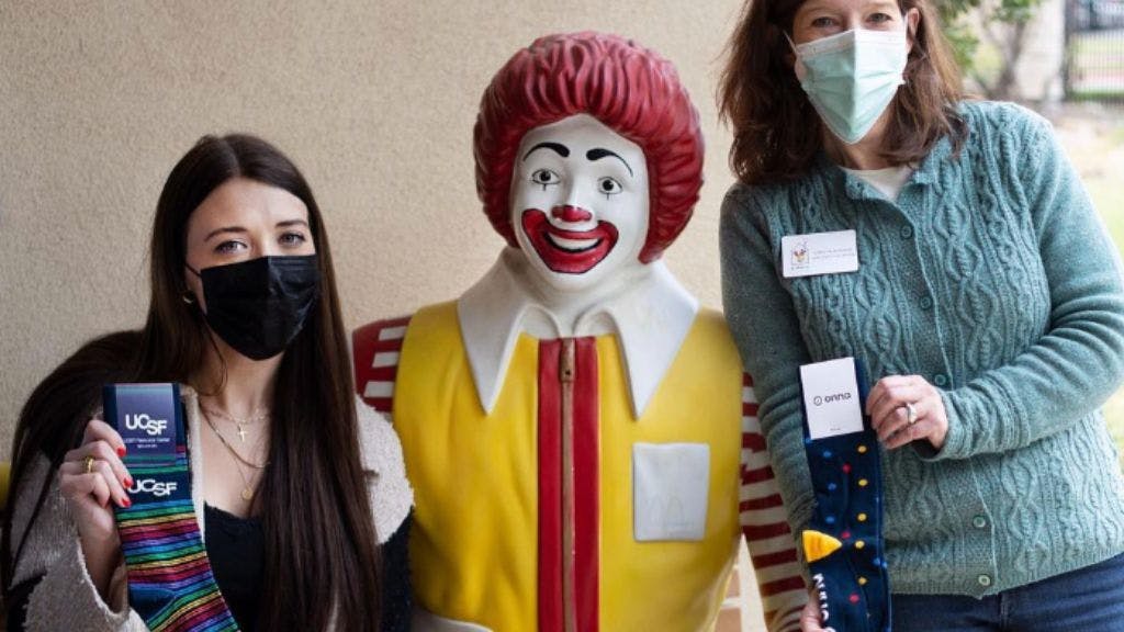 Sock Club employees giving socks back to the Ronald McDonald House in Austin Texas
