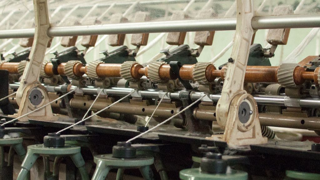 Cotton yarn spinning machine turning cotton into yarn for custom socks