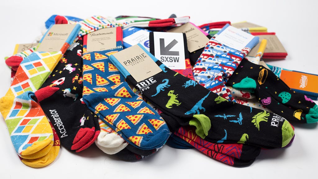 pile of custom socks bulk