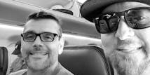 SoCreate CEO Justin and CTO Billy on a plane flying to a developer conference along with the rest of the development team.