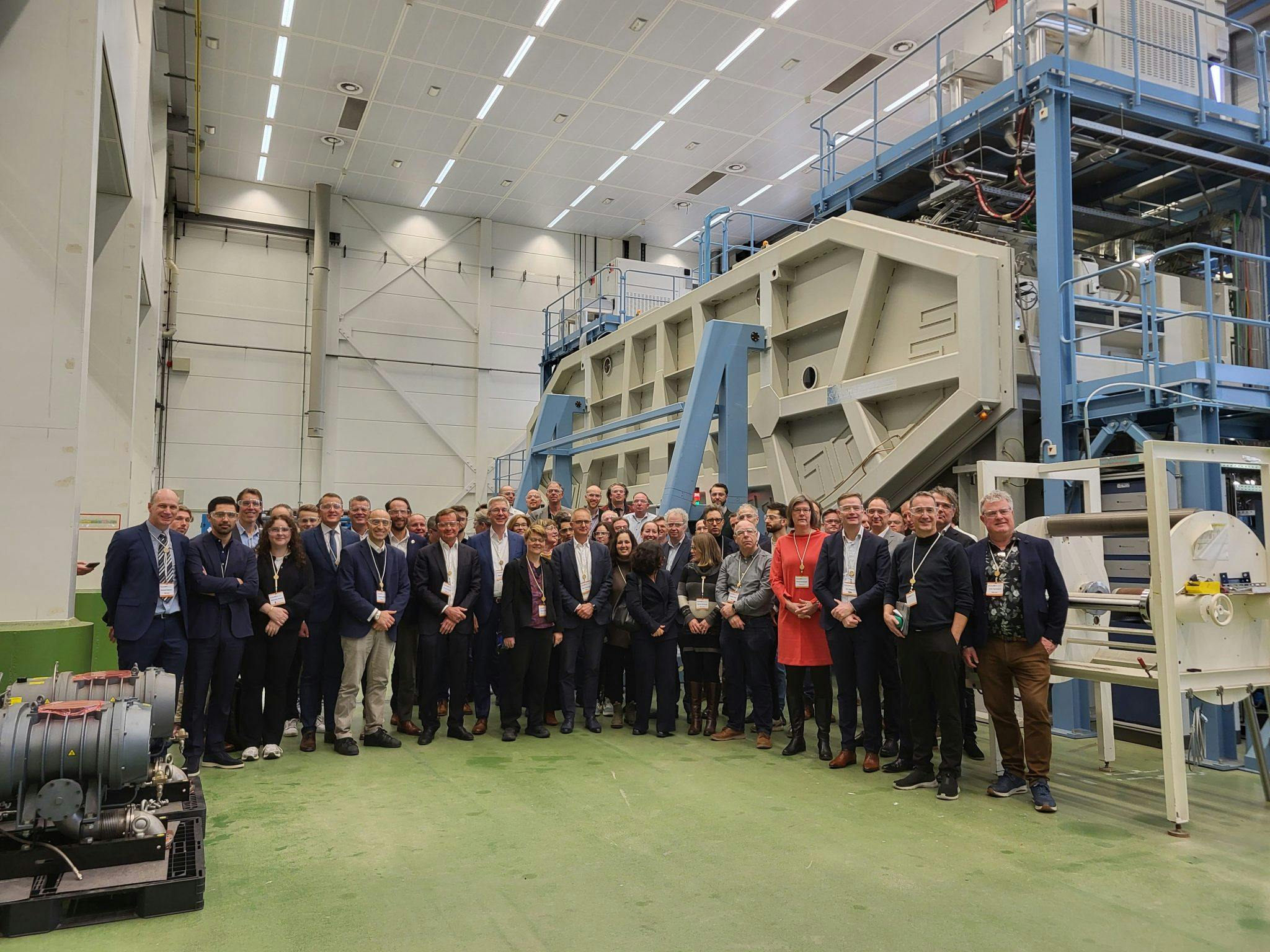 SolarNL partners and guests in the solar foil factory of HyET Solar in Arnhem.