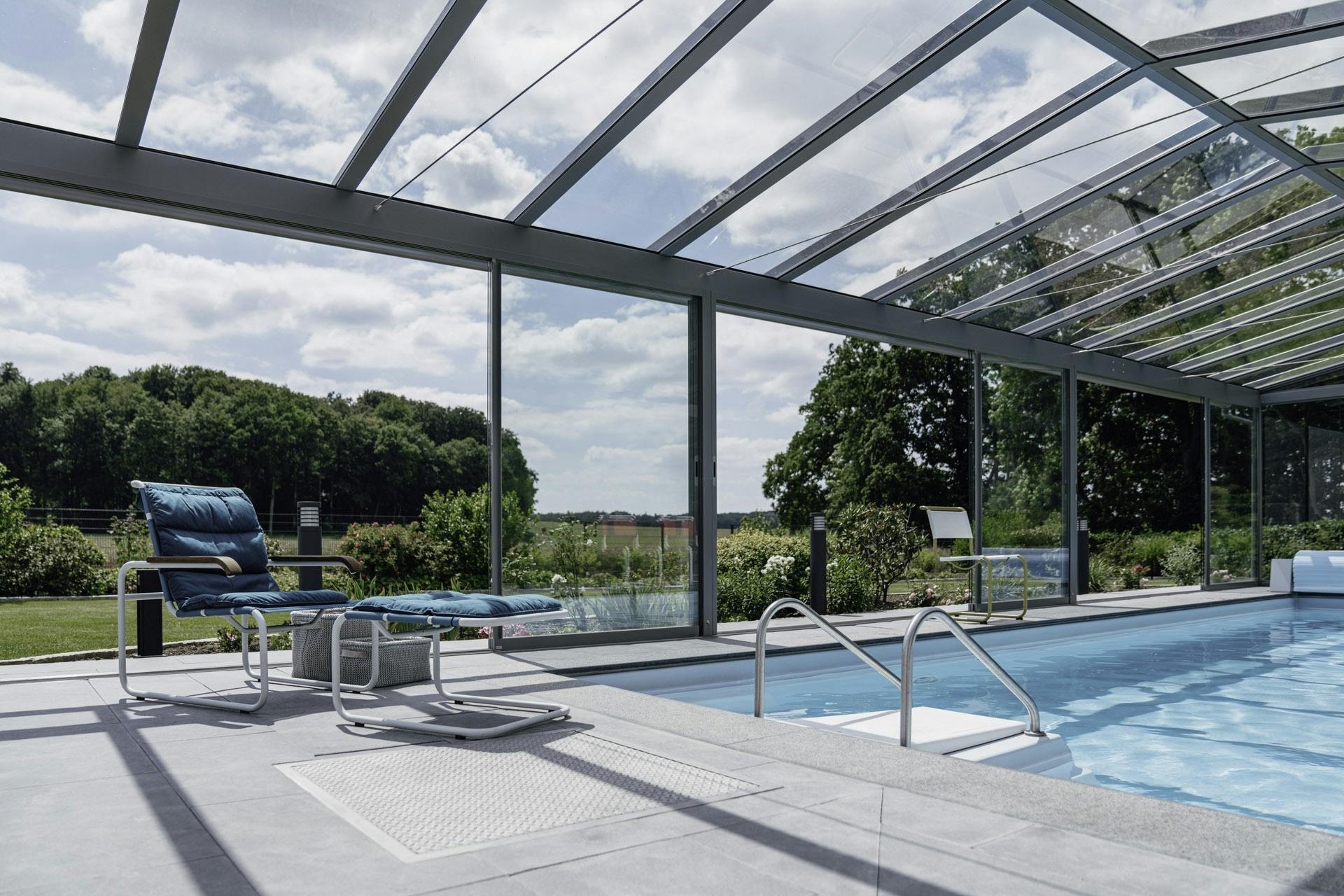 glass room with swimming pool
