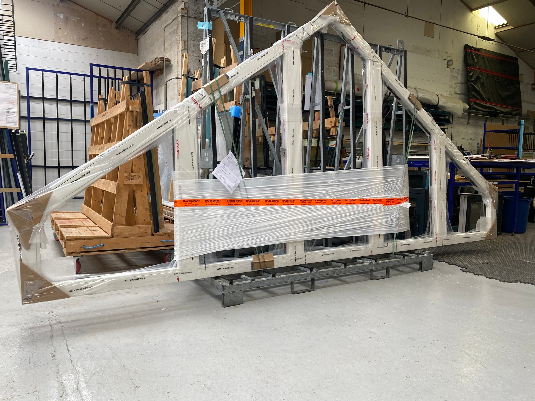 Reveal factory with bespoke shaped window