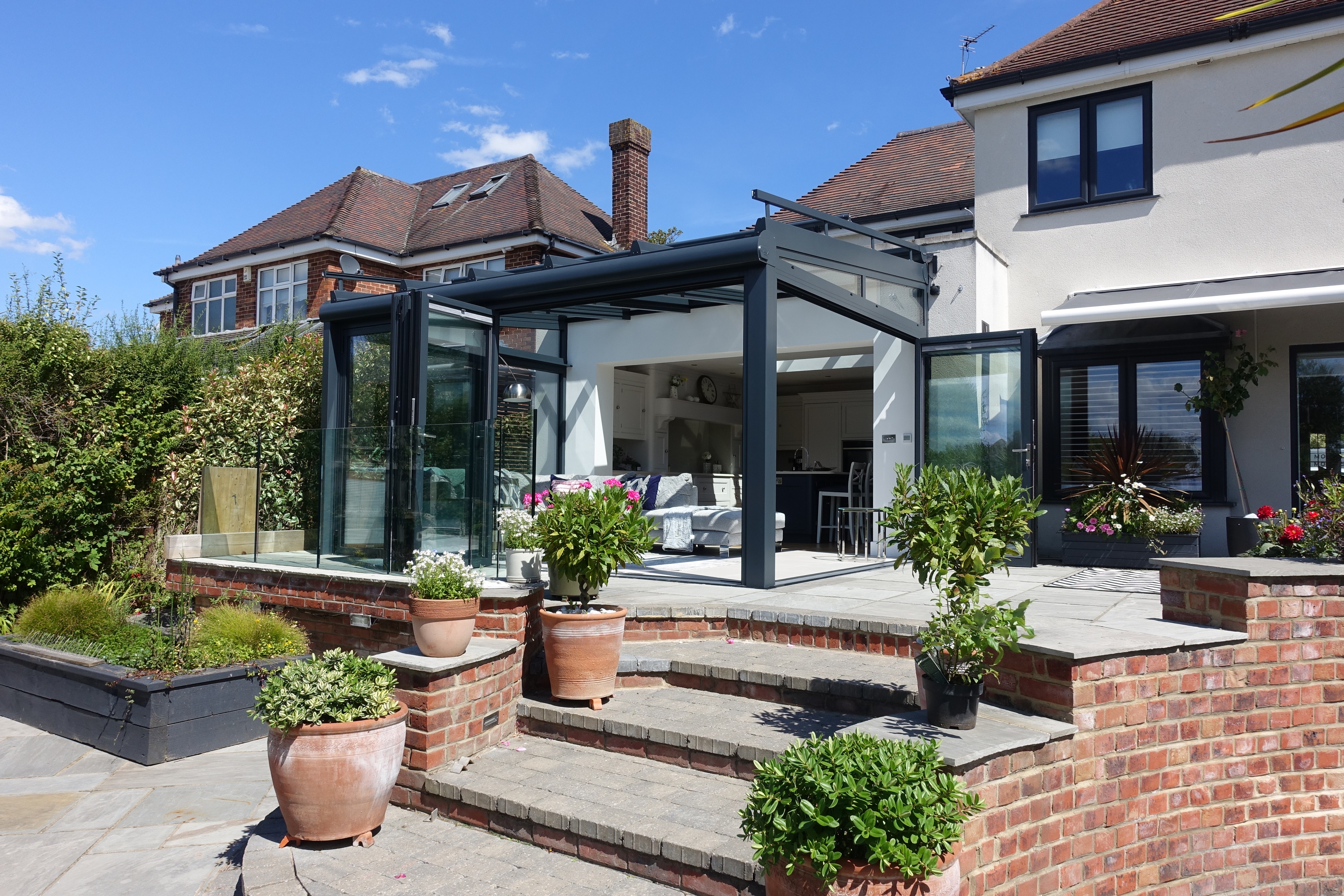 Glass garden room extension on the coast