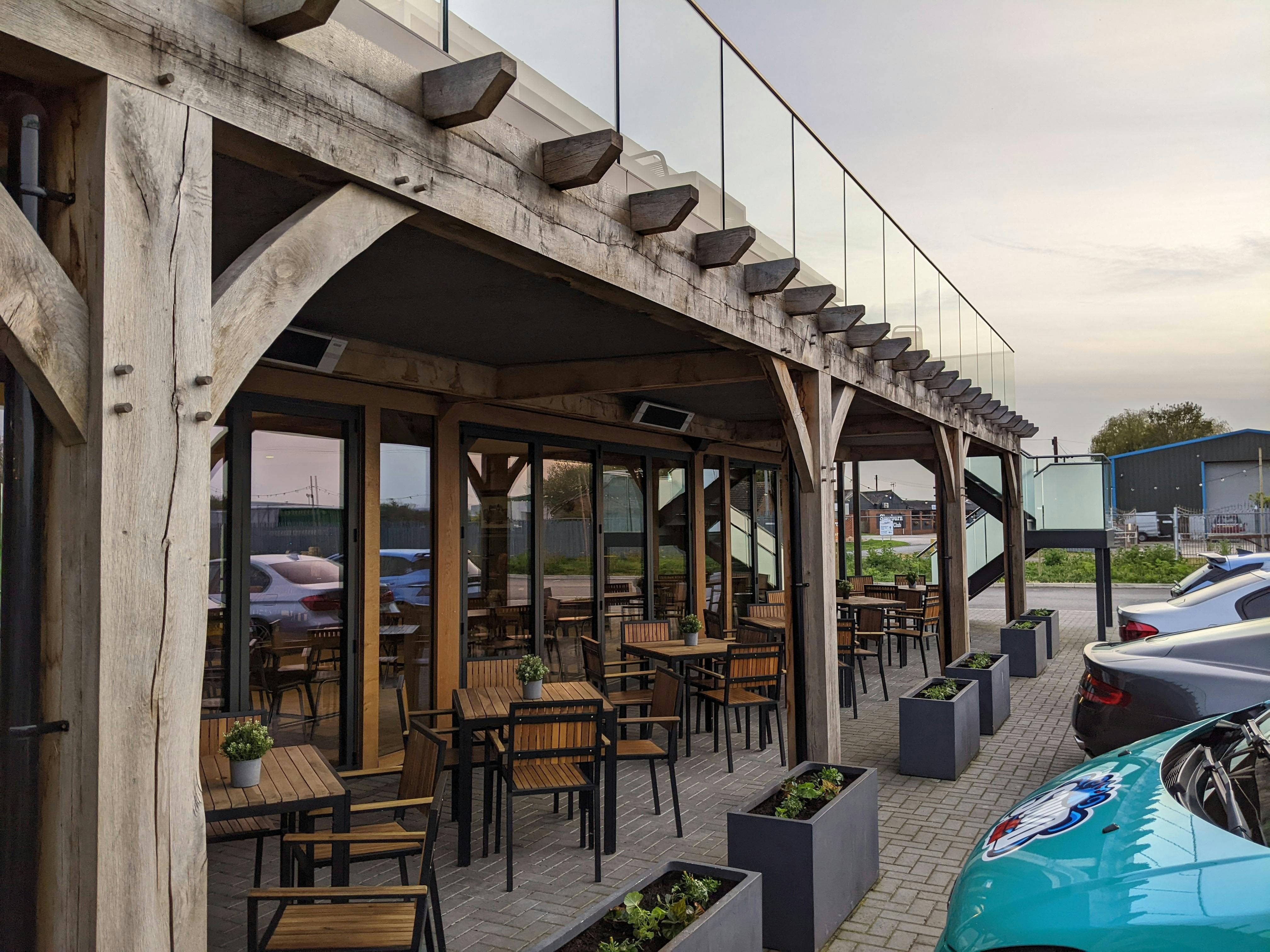 Bi-fold doors stretch across the whole width of The Arnage restaurant.